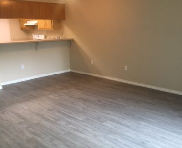 picture of willow park middle remodeled townhome living room with laminate flooring