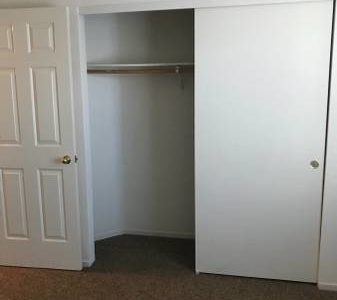 photo of windsor court duplex bedroom closet